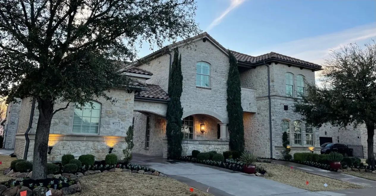 Established residential landscaping and mature trees at a DFW home by Godoy's Wolves